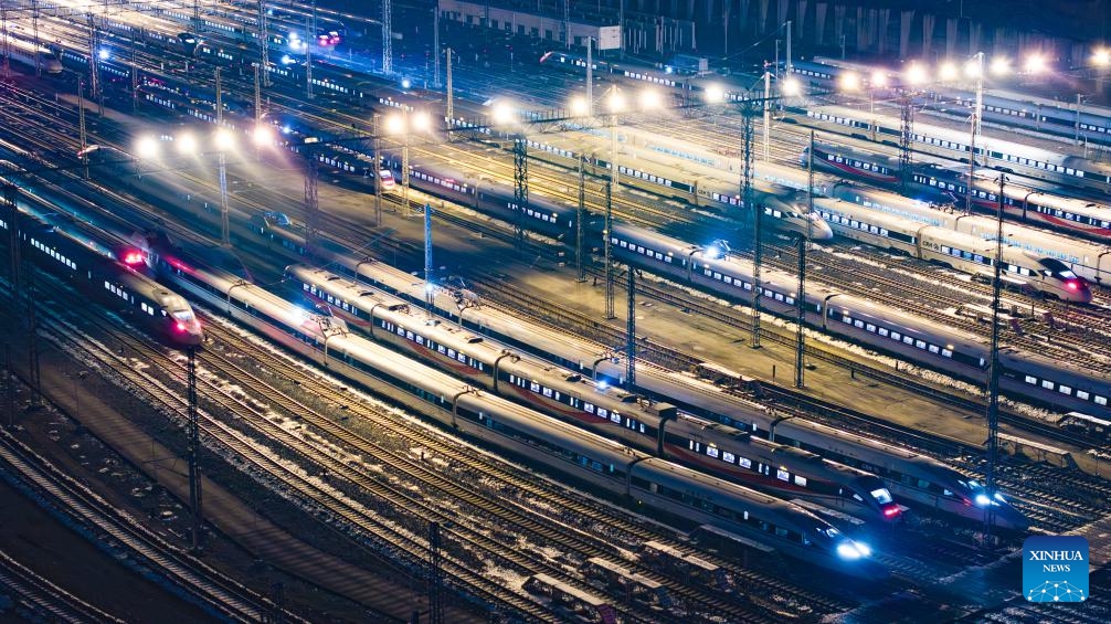 An aerial drone photo taken on Jan. 25, 2024 shows bullet trains at Guiyang North bullet train maintenance station in Guiyang, southwest China's Guizhou Province. The Spring Festival, China's biggest traditional festival, will fall on Feb. 10, while the Spring Festival travel rush, usually a period of high transportation demand as people return home for family reunions, will run from Jan. 26 to March 5.(Photo: Xinhua)