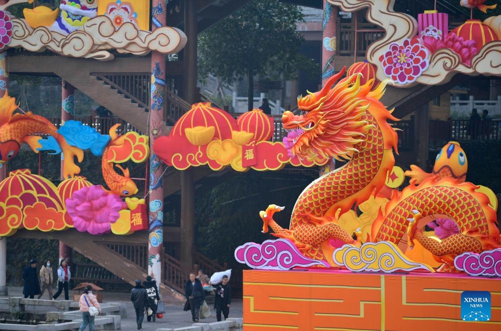 This photo taken on Jan. 29, 2024 shows a dragon-shaped installation in preparation for the upcoming Chinese Lunar New Year in Xuan'en County, central China's Hubei Province. Festive decorations are seen across the country as the Spring Festival approaches.(Photo: Xinhua)