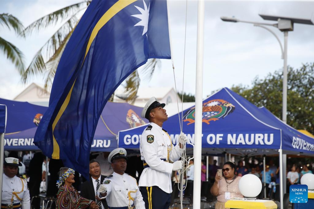 Nauru's national flag is raised during the ceremony celebrating Nauru's 56th anniversary of independence in Nauru, Jan. 31, 2024. Nauru held a ceremony to celebrate its 56th anniversary of independence on Wednesday.(Photo: Xinhua)