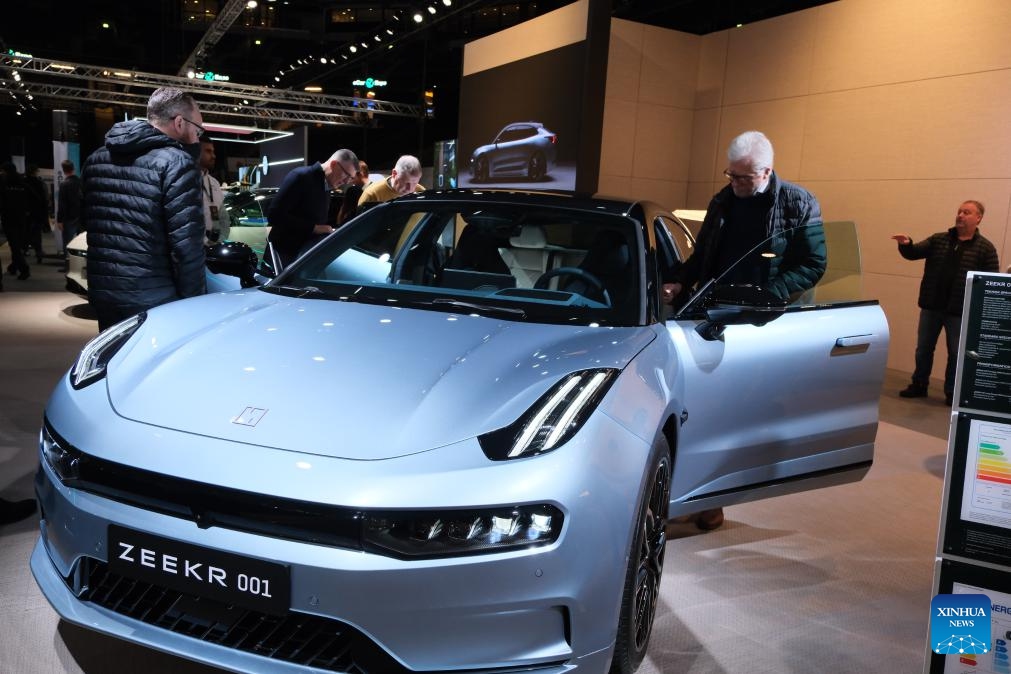 People look at an electric vehicle of Zeekr at the Swedish eCarExpo 2024 in Stockholm, Sweden, on Feb. 2, 2024. Swedish eCarExpo 2024 kicked off here Friday, with about 70 exhibitors showcasing their latest products during the three-day event.(Photo: Xinhua)
