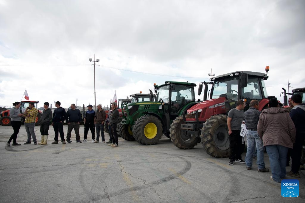 People take part in a protest in Attard, Malta, on Feb. 2, 2024. Farmers in Malta joined their European Union (EU) peers in protests on Friday against the bloc's present framework and future ambitions that threaten their livelihood.(Photo: Xinhua)