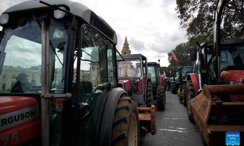 Tractors are seen in a protest in Floriana, Malta, on Feb. 2, 2024. Farmers in Malta joined their European Union (EU) peers in protests on Friday against the bloc's present framework and future ambitions that threaten their livelihood.(Photo: Xinhua)