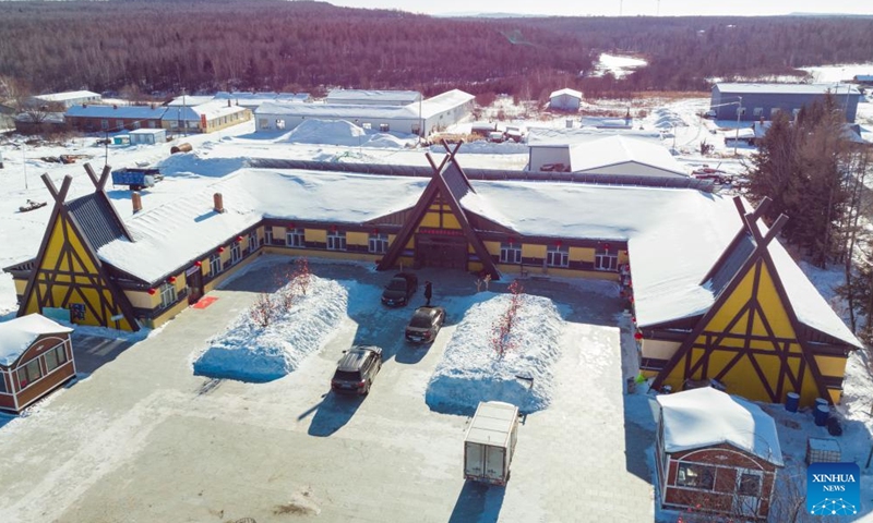 An aerial drone photo taken on Feb. 2, 2024 shows a tourist center of Pingtai Village in Xunke County of Heihe, northeast China's Heilongjiang Province.