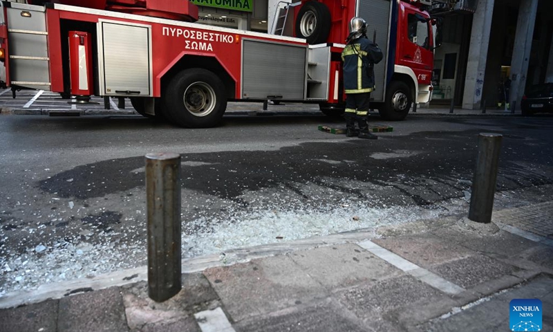 Broken glass is seen near the Ministry of Labor and Social Affairs after a bomb exploded opposite the ministry building in Athens, Greece, Feb. 3, 2024. A bomb exploded opposite the Ministry of Labor and Social Affairs in central Athens on Saturday, causing extensive material damage, but no injuries, Greek national broadcaster ERT reported. (Xinhua/Marios Lolos)