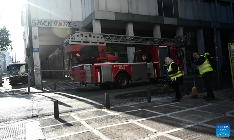 A fire engine is seen at the Ministry of Labor and Social Affairs after a bomb exploded opposite the ministry building in Athens, Greece, Feb. 3, 2024. A bomb exploded opposite the Ministry of Labor and Social Affairs in central Athens on Saturday, causing extensive material damage, but no injuries, Greek national broadcaster ERT reported. (Xinhua/Marios Lolos)