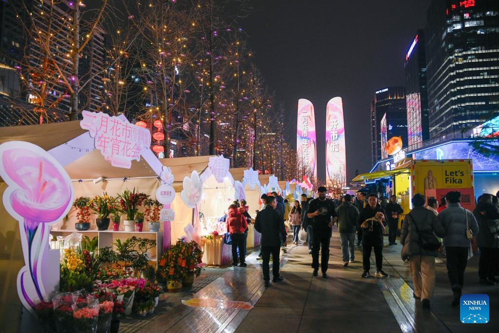 This photo taken on Feb. 4, 2024 shows a flower fair in a street in Chengdu, southwest China's Sichuan Province. Flower-themed fairs are being held in Chengdu to celebrate the upcoming Chinese New Year.(Photo: Xinhua)