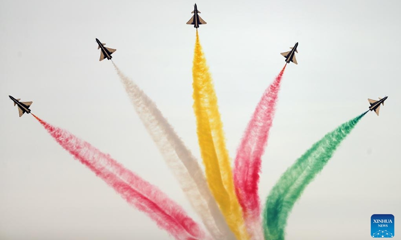 Aircraft of the Bayi Aerobatic Team of the Chinese People's Liberation Army (PLA) Air Force present an air show during the second edition of the World Defense Show in Riyadh, Saudi Arabia, on Feb. 5, 2024. Saudi Arabia kicked off Sunday the second edition of the World Defense Show in the capital Riyadh, with Chinese defense delegation and Chinese air force attending.(Photo: Xinhua)