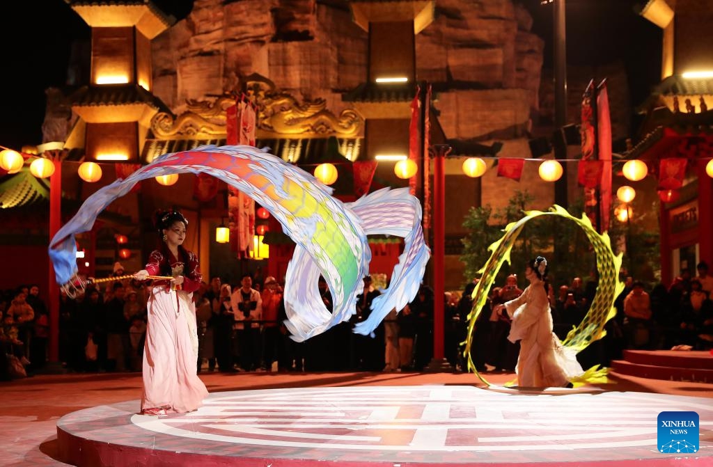 Actors perform during an event celebrating the upcoming Chinese Lunar New Year, or the Spring Festival, at the Chinatown of the Boulevard World in Riyadh, Saudi Arabia, on Feb. 5, 2024.(Photo: Xinhua)