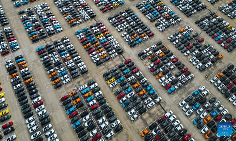 An aerial drone photo taken on Feb. 8, 2024 shows vehicles for export parking at the Ningde land port in Ningde, southeast China's Fujian Province. The Ningde land port, with vehicle transportation railway lines and vehicle loading and unloading platforms, has served as a logistics distribution center and shipment hub for vehicles to be exported to global markets. Photo: Xinhua