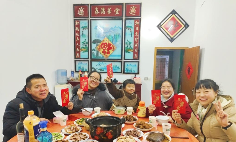 People have a family reunion dinner in Peiji Village of Lai'an County, Chuzhou, east China's Anhui Province, Feb. 9, 2024. People across the country enjoy the festive atmosphere with family reunion dinners on the eve of Chinese Lunar New Year on Friday. Photo: Xinhua