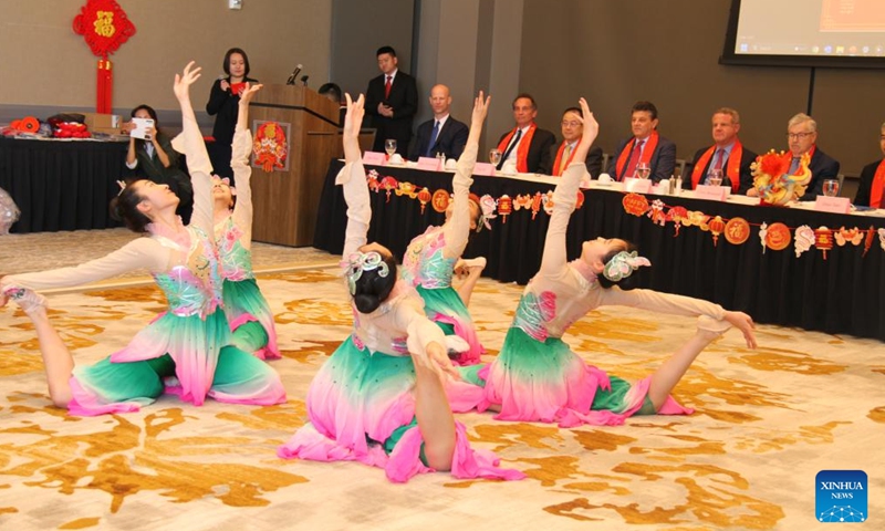 Students of the High School Affiliated to Renmin University of China stage a dance during an event to celebrate Chinese Lunar New Year in Muscatine, Iowa, the United States, Feb. 9, 2024. (Xinhua/Xu Jing)