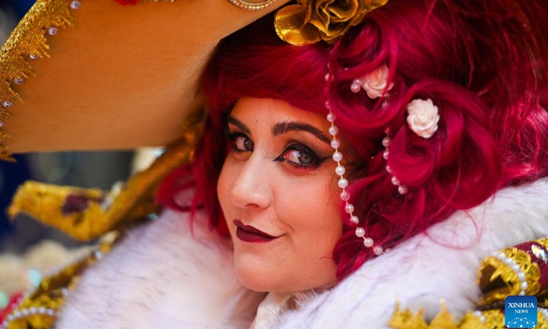 A reveler participates in a carnival parade in Valletta, Malta, Feb. 11, 2024. The historic city of Valletta has become a colorful and musical heaven with marching bands, street performers and dancers as Malta celebrates the carnival from Feb. 9 to 13. (Photo by Jonathan Borg/Xinhua)