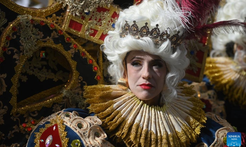 A reveler participates in a carnival parade in Valletta, Malta, Feb. 11, 2024. The historic city of Valletta has become a colorful and musical heaven with marching bands, street performers and dancers as Malta celebrates the carnival from Feb. 9 to 13. (Photo by Jonathan Borg/Xinhua)