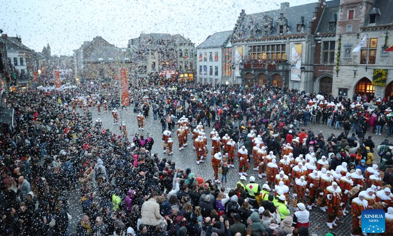 People attend the parade of Shrove Tuesday, the last day of Carnival, in Binche, Belgium, Feb. 13, 2024. Binche's three-day carnival, a UNESCO World Heritage event and one of the most famous carnivals in Europe, reached its climax on Tuesday. (Photo: Xinhua)