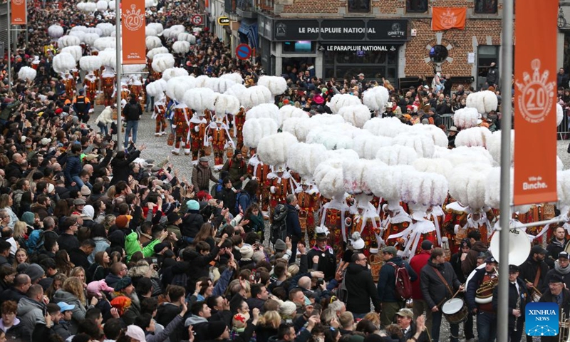 People attend the parade of Shrove Tuesday, the last day of Carnival, in Binche, Belgium, Feb. 13, 2024. Binche's three-day carnival, a UNESCO World Heritage event and one of the most famous carnivals in Europe, reached its climax on Tuesday. (Photo: Xinhua)