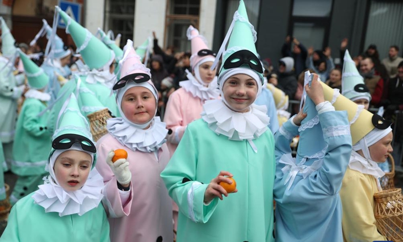 Children wearing costumes of Pierrot attend the parade of Shrove Tuesday, the last day of Carnival in Binche, Belgium, Feb. 13, 2024. Binche's three-day carnival, a UNESCO World Heritage event and one of the most famous carnivals in Europe, reached its climax on Tuesday. (Photo: Xinhua)