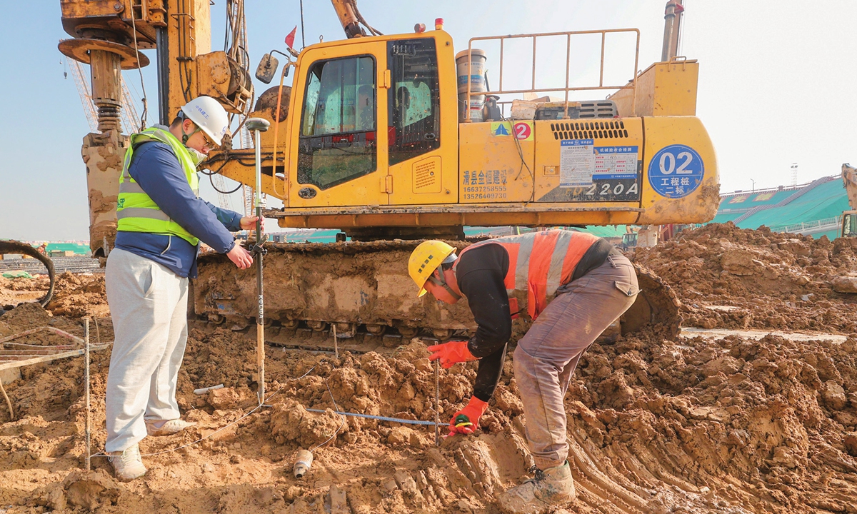 Work is in progress at the construction site of the Xiong'an section of the Xiong'an-Xinzhou High-speed Railway in Xiong'an New Area, North China's Hebei Province on February 16, 2024. In less than seven years, Xiong'an has been transformed from a blueprint into reality, with over 3,000 buildings rising from the previously barren lowlands and shabby villages. Photo: cnsphoto