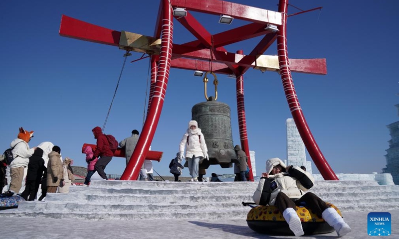 Tourists have fun at Harbin Ice-Snow World in Harbin, northeast China's Heilongjiang Province, Feb. 15, 2024. In addition to following traditional customs, more and more Chinese People choose to enrich their life by spending the Spring Festival holiday in diversified and original ways. (Photo: Xinhua)