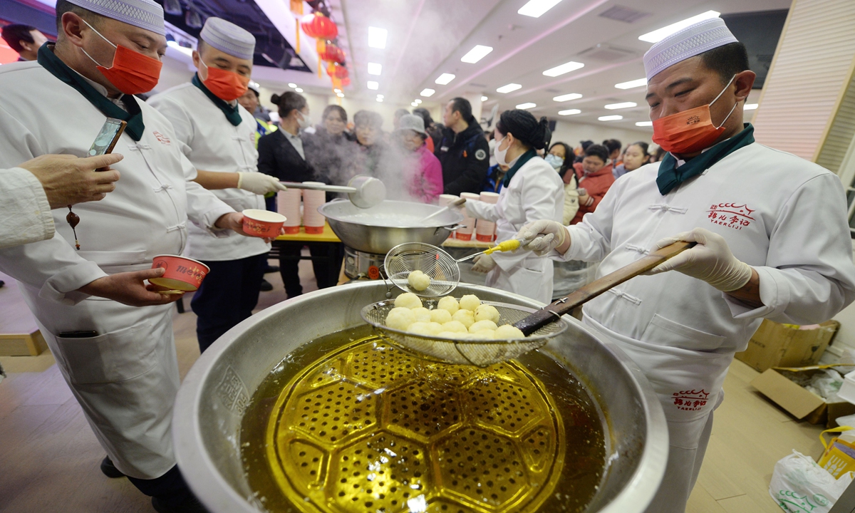 
Residents and officials from Beijing's Xicheng district gather together to celebrate the approaching Lantern Festival in Shichahai on February 20, 2024. During the event, they guessed lantern riddles, made flower lanterns and enjoyed traditional glutinous rice balls known as yuanxiao. The Lantern Festival this year falls on February 24, 2024, and it usually marks the end of the Spring Festival. Photo: VCG