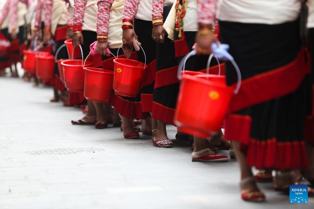 People take part in a parade during Bhimsen Puja celebration in Lalitpur, Nepal, on Feb. 21, 2024.(Photo: Xinhua)