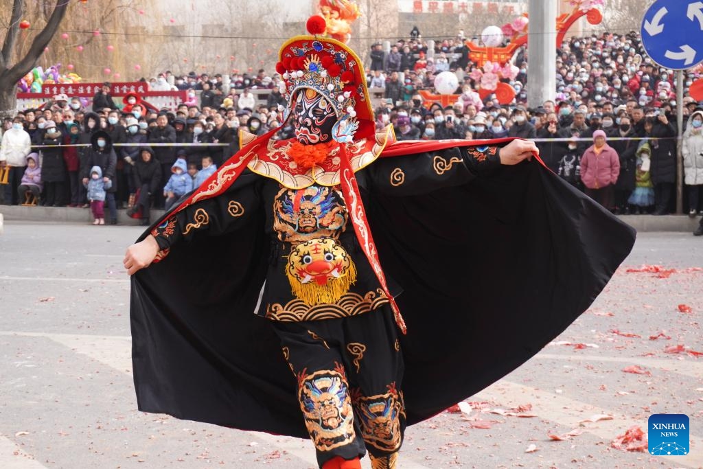 An actor performs traditional opera during a Shehuo show in Yuzhong County of Lanzhou, northwest China's Gansu Province, Feb. 20, 2024. Shehuo, a traditional folk celebration in China, is a festivity in multiple forms consisting of dragon dance, lion dance, traditional Chinese opera, drum playing and other folk performances that may vary in different regions.(Photo: Xinhua)