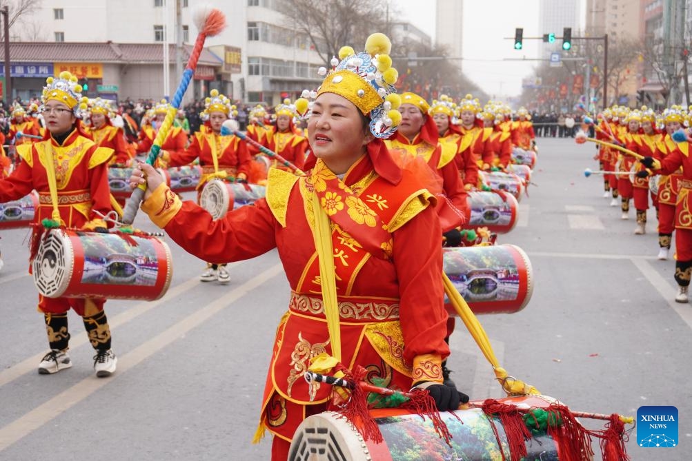 Performers play drums during a Shehuo show in Yuzhong County of Lanzhou, northwest China's Gansu Province, Feb. 20, 2024. Shehuo, a traditional folk celebration in China, is a festivity in multiple forms consisting of dragon dance, lion dance, traditional Chinese opera, drum playing and other folk performances that may vary in different regions.(Photo: Xinhua)