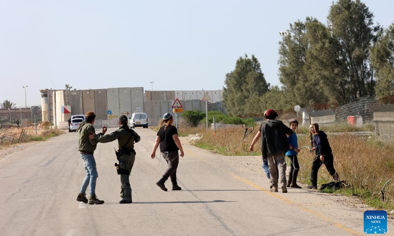 Israeli demonstrators are pictured near the Kerem Shalom border crossing in southern Israel on Feb. 20, 2024. These demonstrators attempted to block humanitarian aid trucks from entering Gaza Strip amid the ongoing Israel-Hamas conflict.(Photo: Xinhua)