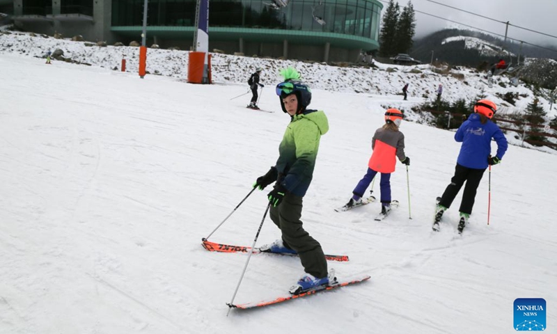 People ski at a winter sports resort in Jasna, Slovakia, Feb. 21, 2024. Jasna greeted lots of visitors to enjoy skiing and snowboarding here in February.(Photo: Xinhua)