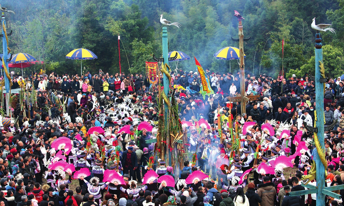 Visitors watch a performance during a traditional festival of the Miao ethnic group in Liuzhou, South China's Guangxi Zhuang Autonomous Region, on February 25, 2024. People celebrate the festival to pray for a good harvest. Photo: VCG