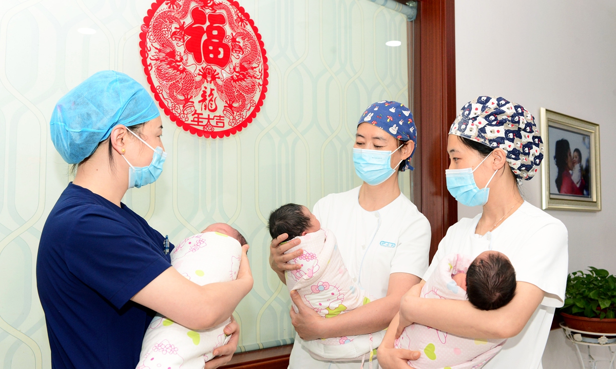 Medical staff at a hospital in Lanzhou, Northwest China’s Gansu Province, take care of newborn babies on February 28, 2024. The hospital delivered 1,035 babies in the first 15 days of the Year of the Dragon. Hospitals in various parts of Gansu have seen a significant increase in newborns during the period. Photo: VCG