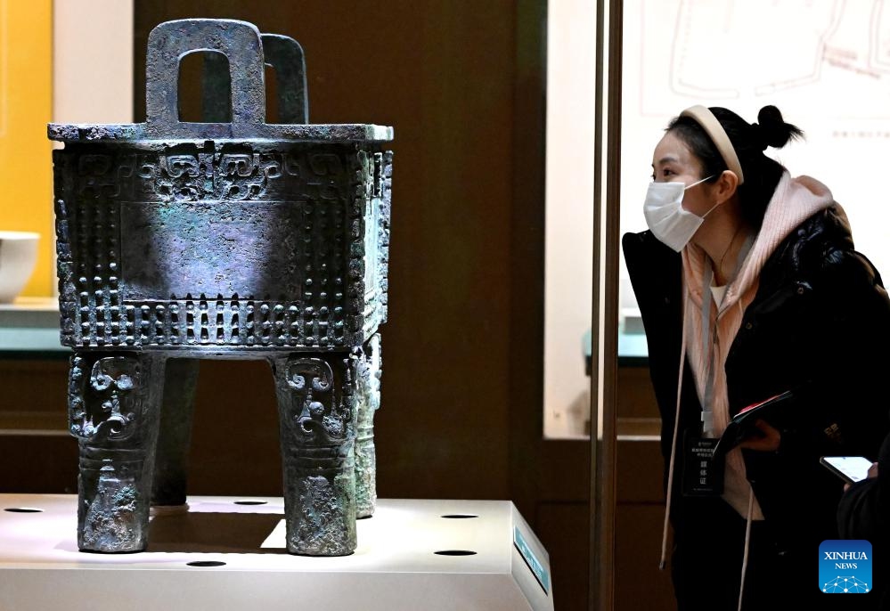 A visitor views an exhibit at the new building of Yinxu Museum in Anyang, central China's Henan Province, Feb. 26, 2024. A new building of the Yinxu Museum in Anyang officially opened to the public on Monday.(Photo: Xinhua)