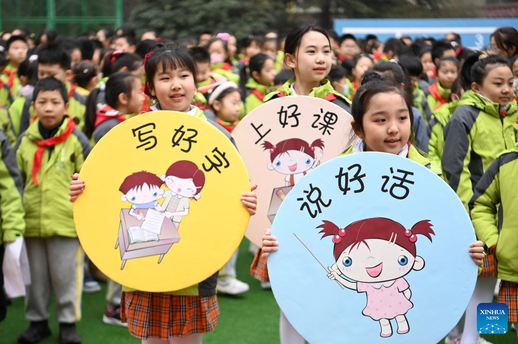 Students attend a ceremony marking the start of the new semester at Fangxin Primary School of Weiyang District in Xi'an City, northwest China's Shaanxi Province, Feb. 26, 2024. The new semester for primary and secondary schools kicked off in many parts of China on Monday(Photo: Xinhua)