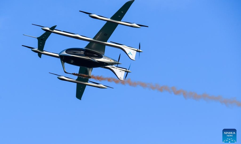 A 5-seat eVTOL (electric vertical takeoff and landing) aircraft flies during a demonstration flight near Shekou Cruise Home port in Shenzhen, south China's Guangdong Province, Feb. 27, 2024. The eVTOL aircraft, developed by a high-tech company AutoFlight and named as Prosperity, completed its first inter-city electric air-taxi demonstration flight from Shekou Cruise Home port in Shenzhen to Jiuzhou Port in Zhuhai.(Photo: Xinhua)