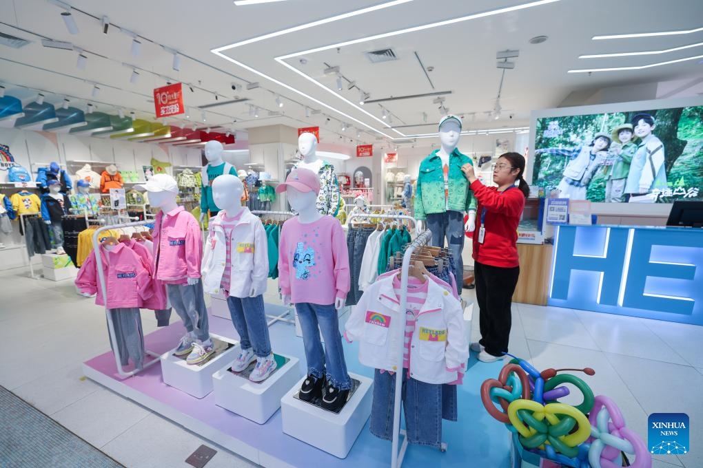 This photo taken on Feb. 27, 2024 shows a store of children's garment at Zhili Town of Huzhou City, east China's Zhejiang Province. Zhili, located in the Yangtze River Delta economic circle, is renowned for its children's garment industry, whose complete industrial chain covers design, production, sales, storage, and logistics.(Photo: Xinhua)