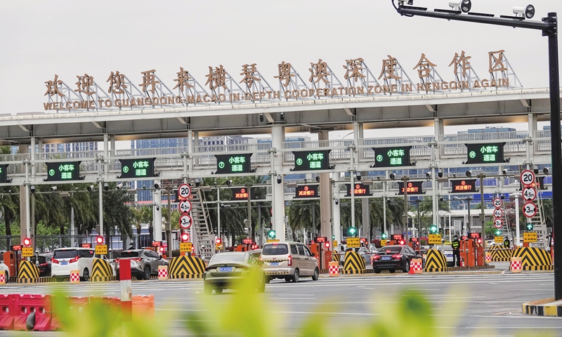 Vehicles cross the Hengqin Bridge to leave the Guangdong Macao In-depth Cooperation Zone in Hengqin in Zhuhai, South China's Guangdong Province on March 1, 2024. The island of Hengqin launches a new customs operation on the same day that allows most goods to be moved there tax-free from neighboring Macao Special Administrative Region. Photo: VCG