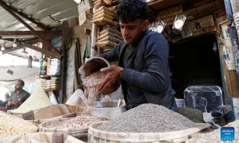 A vendor works at a food market in Sanaa, Yemen, on Feb. 28, 2024. A food security assessment conducted by the United Nations World Food Programme (WFP) revealed on Thursday that over half of households in Yemen are now unable to access adequate food, a worrying rise driven largely by the suspension of humanitarian assistance in areas controlled by the Houthi group.(Photo: Xinhua)