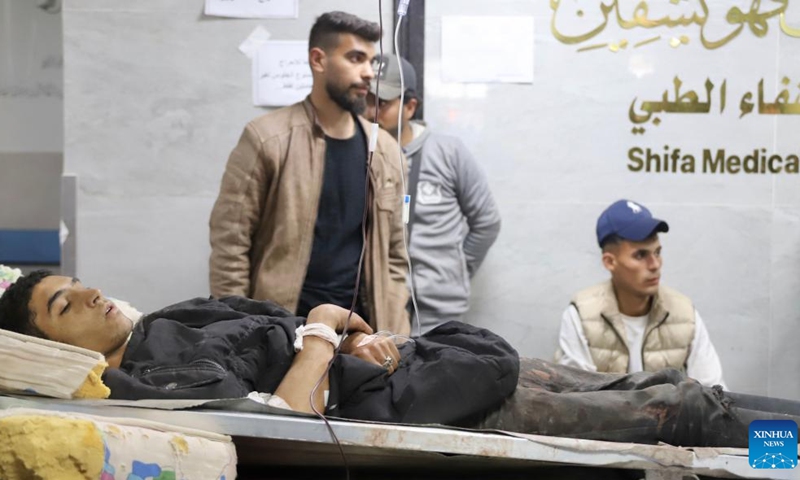 An injured man is seen at Al-Shifa Hospital in Gaza City, on Feb. 29, 2024. Israeli forces opened fire Thursday on a crowd of Palestinians waiting for aid on a coastal road west of Gaza City, killing 104 people and wounding more than 760, Palestinian officials said.(Photo: Xinhua)