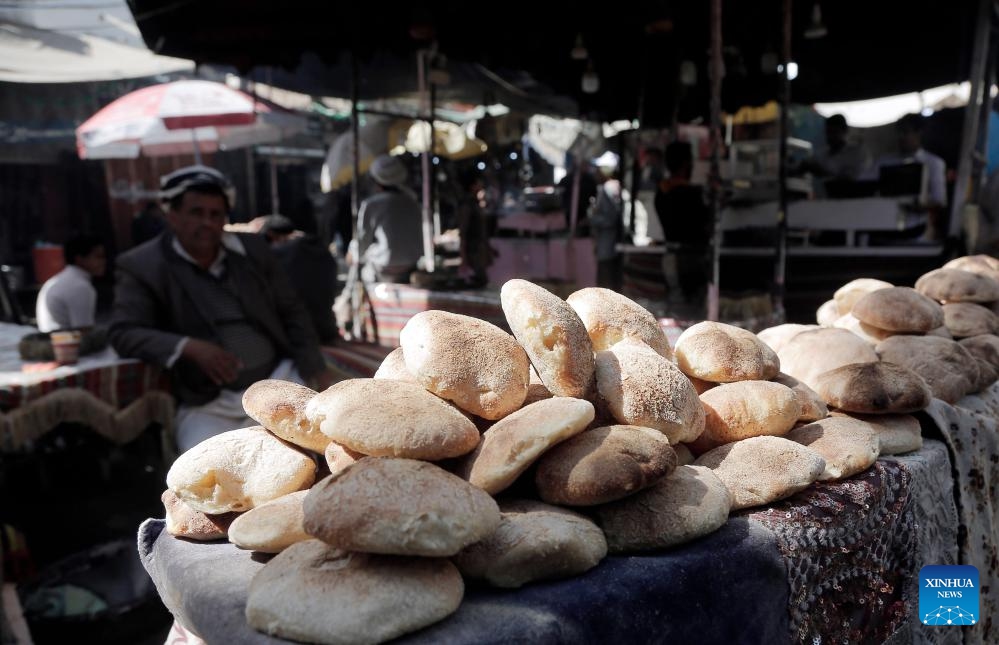 A vendor works at a food market in Sanaa, Yemen, on Feb. 28, 2024. A food security assessment conducted by the United Nations World Food Programme (WFP) revealed on Thursday that over half of households in Yemen are now unable to access adequate food, a worrying rise driven largely by the suspension of humanitarian assistance in areas controlled by the Houthi group.(Photo: Xinhua)