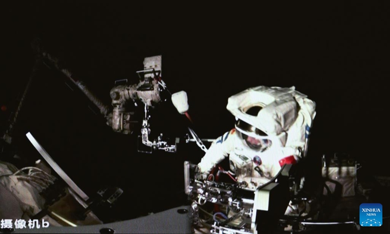 This screen image captured at Beijing Aerospace Control Center on March 2, 2024 shows Shenzhou-17 astronaut Jiang Xinlin performing extravehicular activities. The Shenzhou-17 crew members, who are currently on board China's space station, have completed their second extravehicular mission on Saturday. (Photo: Xinhua)