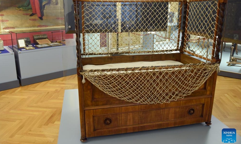 This photo taken on March 1, 2024 shows a baby cot of Austrian royal family displayed at the Vienna Furniture Museum in Vienna, Austria. With 165,000 exhibits, the Vienna Furniture Museum is one of the world's largest furniture museums today, presenting the culture of furniture from over three centuries. (Photo: Xinhua)