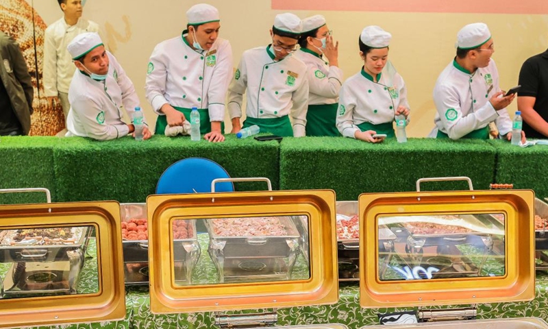 Chefs are seen as they wait for the official result of a Guinness World Record attempt during the National Hog Festival in Quezon City, the Philippines, on March 1, 2024. Hog farmers in Quezon City set the Guinness World Record for the most varieties of pork dishes on display during the launch of the five-day National Hog Festival on Friday. (Photo: Xinhua)