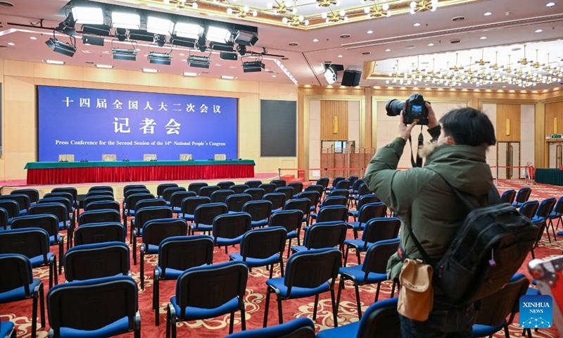 A reporter works at the press center for China's upcoming annual legislative and political consultative sessions in Beijing, capital of China, Feb. 27, 2024. The press center opened Tuesday at the Media Center Hotel in Beijing.The second session of the 14th National People's Congress (NPC) and the second session of the 14th National Committee of the Chinese People's Political Consultative Conference (CPPCC) will open on March 5 and 4, respectively. Photo: Xinhua