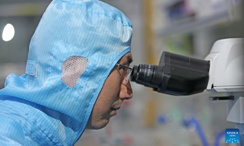 Sun Dongming observes an experimental sample at a laboratory of the Institute of Metals of the Chinese Academy of Sciences in Shenyang, northeast China's Liaoning Province, Feb. 24, 2024. Photo: Xinhua