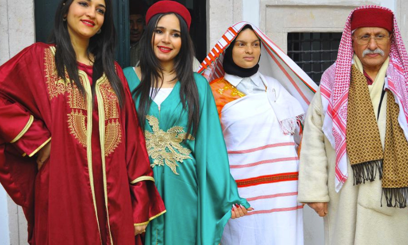 People dressed in traditional costumes attend a celebration for the national day of traditional dress in Tunis, Tunisia, on March 10, 2024. (Photo by Adel Ezzine/Xinhua)