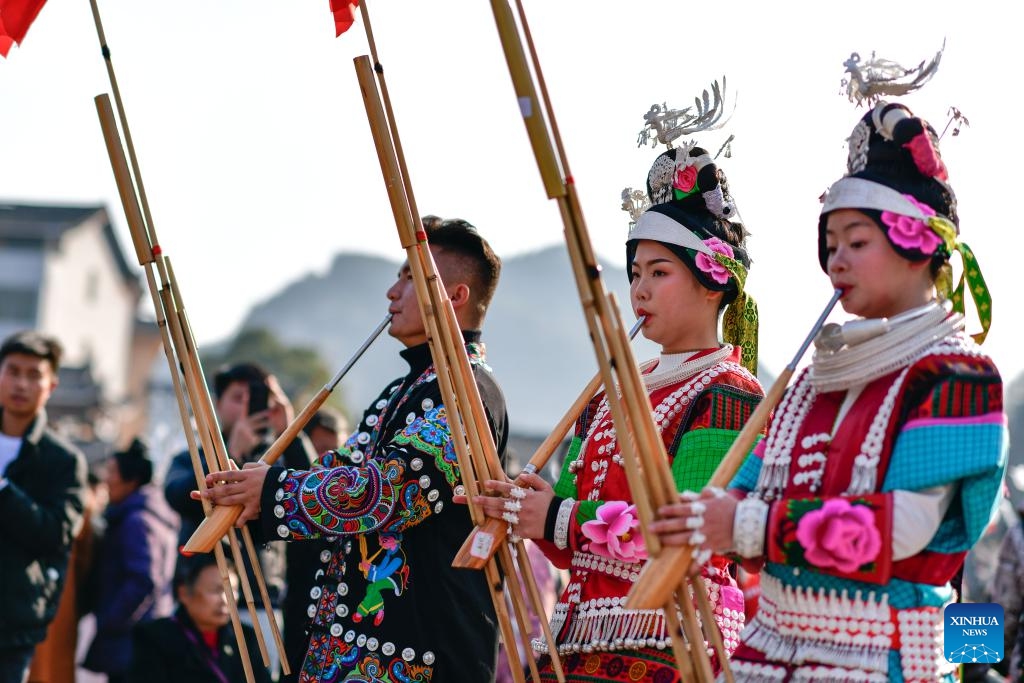 Girls of Miao ethnic group perform Lusheng, a traditional musical instrument, in celebration of the Gannangxiang festival in Kaili, Qiandongnan Miao and Dong Autonomous Prefecture, southwest China's Guizhou Province, March 2, 2024. In Kaili, local ethnic Miao people have the custom of donning their traditional attire and performing Lusheng, a traditional musical instrument, to rejoice in the annual Gannangxiang festival, a time-honored celebration in Guizhou Province. (Photo: Xinhua)