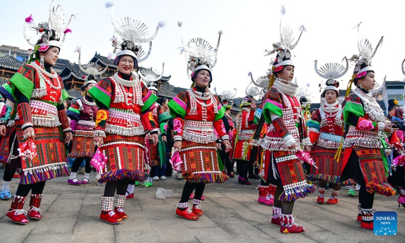 Girls of Miao ethnic group perform a dance in celebration of the Gannangxiang festival in Kaili, Qiandongnan Miao and Dong Autonomous Prefecture, southwest China's Guizhou Province, March 2, 2024. In Kaili, local ethnic Miao people have the custom of donning their traditional attire and performing Lusheng, a traditional musical instrument, to rejoice in the annual Gannangxiang festival, a time-honored celebration in Guizhou Province. (Photo: Xinhua)