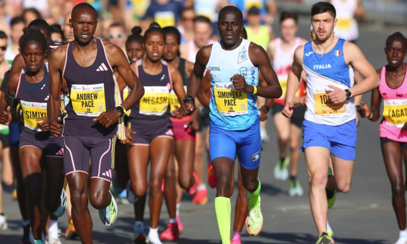 People run at Run Rome the Marathon in Rome, Italy, March 17, 2024. (Xinhua/Li Jing)