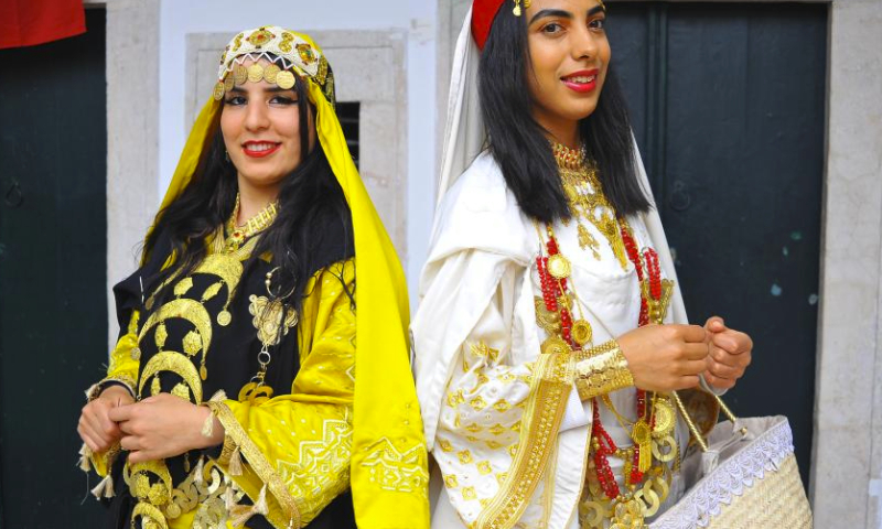 People dressed in traditional costumes attend a celebration for the national day of traditional dress in Tunis, Tunisia, on March 10, 2024. (Photo by Adel Ezzine/Xinhua)