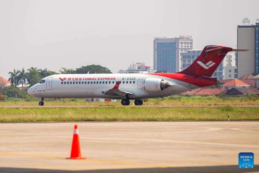 This photo taken on March 4, 2024 shows a Chinese airplane ARJ21 at Wattay International Airport in Vientiane, Laos. Chinese airplanes C919 and ARJ21 developed by the Commercial Aircraft Corporation of China, Ltd. (COMAC) on Monday arrived in Laos for a static display and demonstration flight.(Photo: Xinhua)