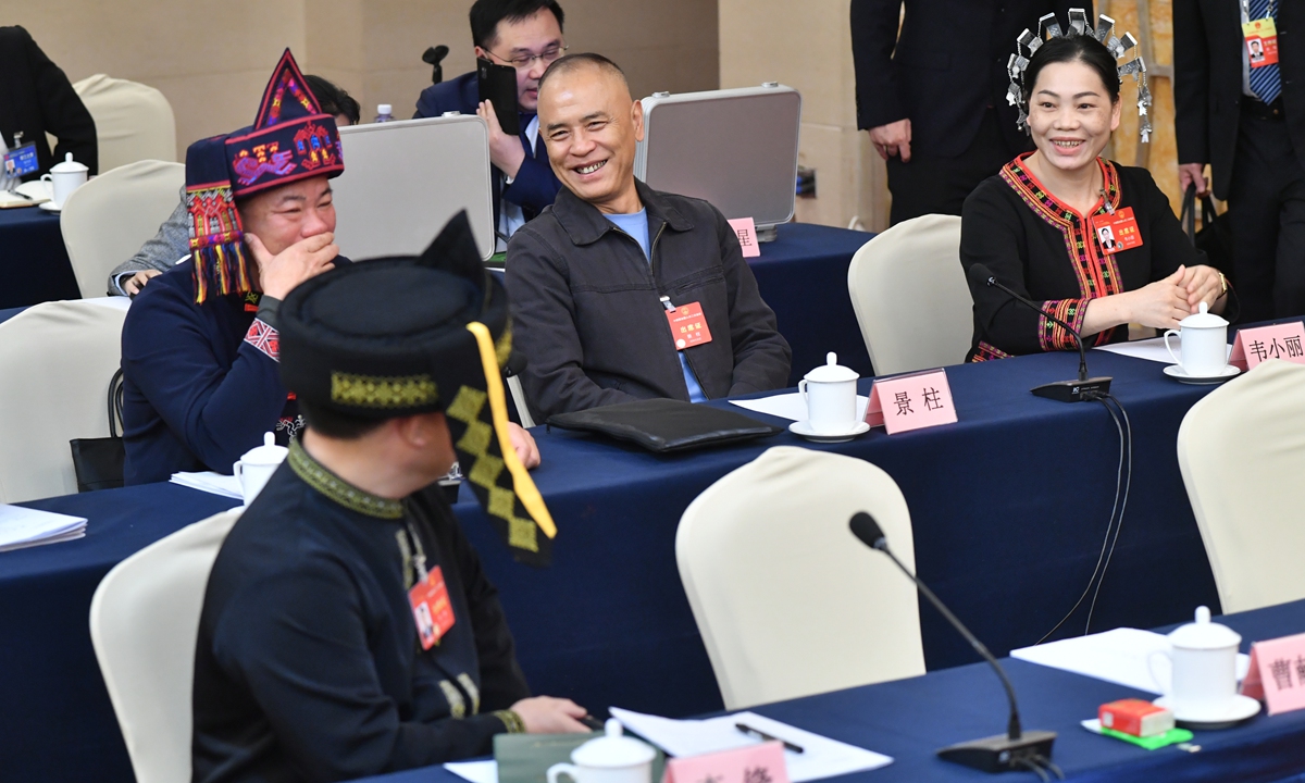 Lawmakers from the Hainan Province delegation to the second session of the 14th National People's Congress (NPC), China's national legislature, hold a group meeting reviewing a draft revision to the Organic Law of the State Council on March 7, 2024, in Beijing. Photo: VCG